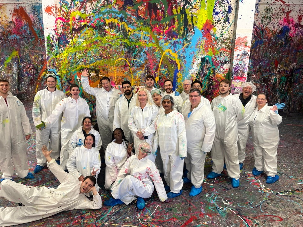 Classic Splatter Party Experience Image 1 a group of people posing for a photo