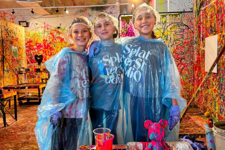 a person standing in front of a store